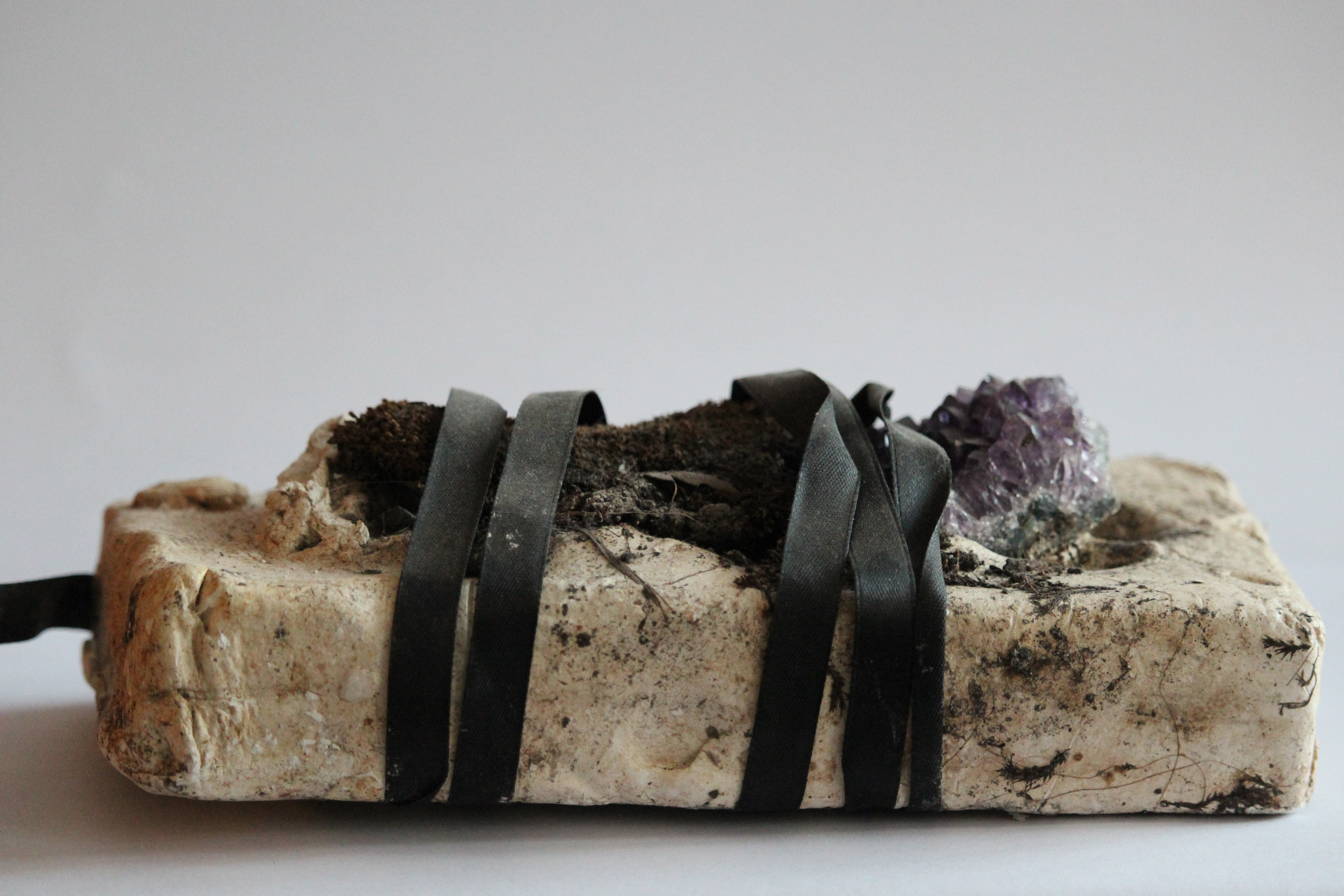 A Spell to bind male artists from murdering you - amethyst in clay brick wrapped in ribbon